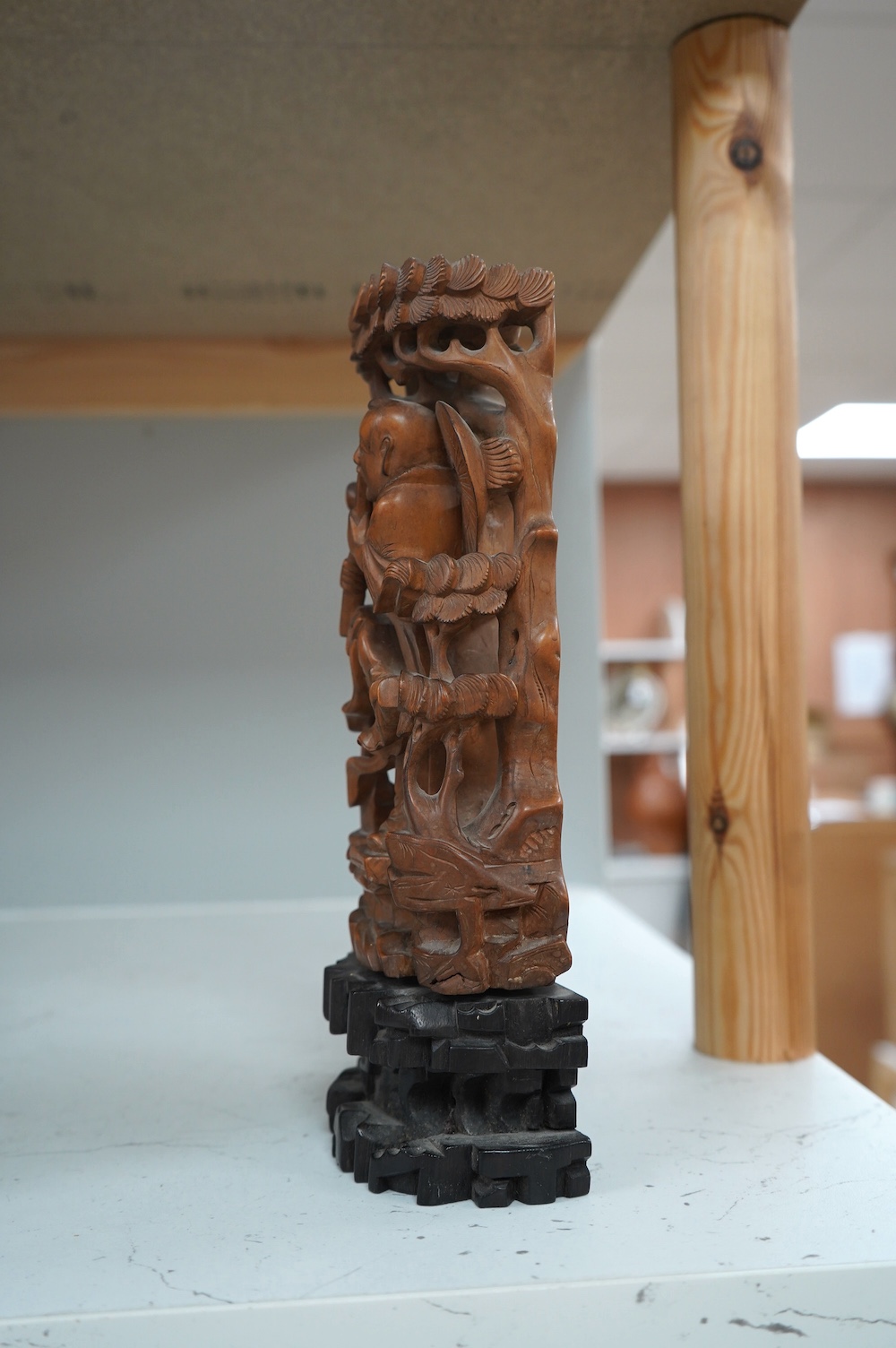 An early 20th century Chinese bamboo carving of an immortal, 23cm. Condition - fair to good